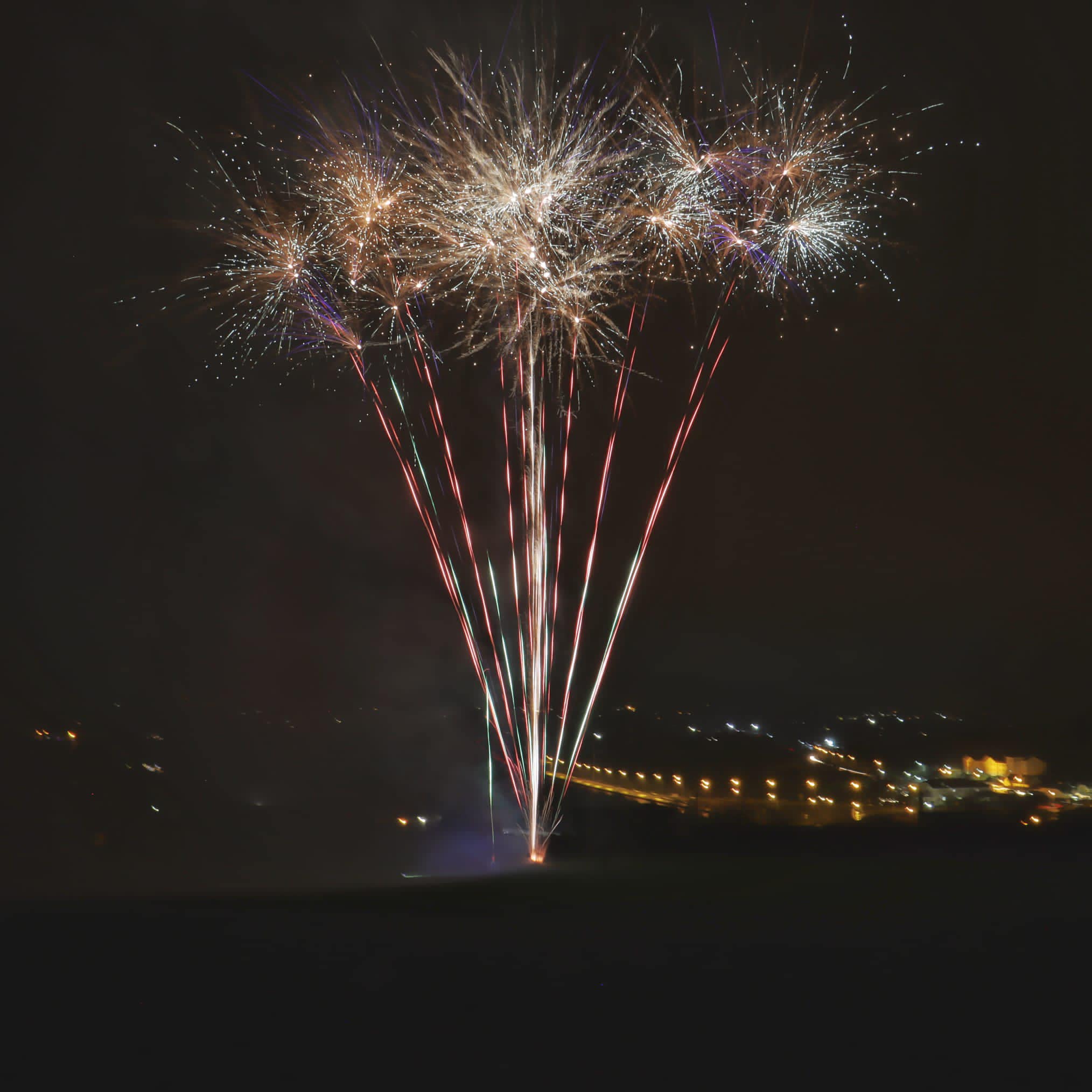 A wide Newry Fireworks display lighting the night sky
